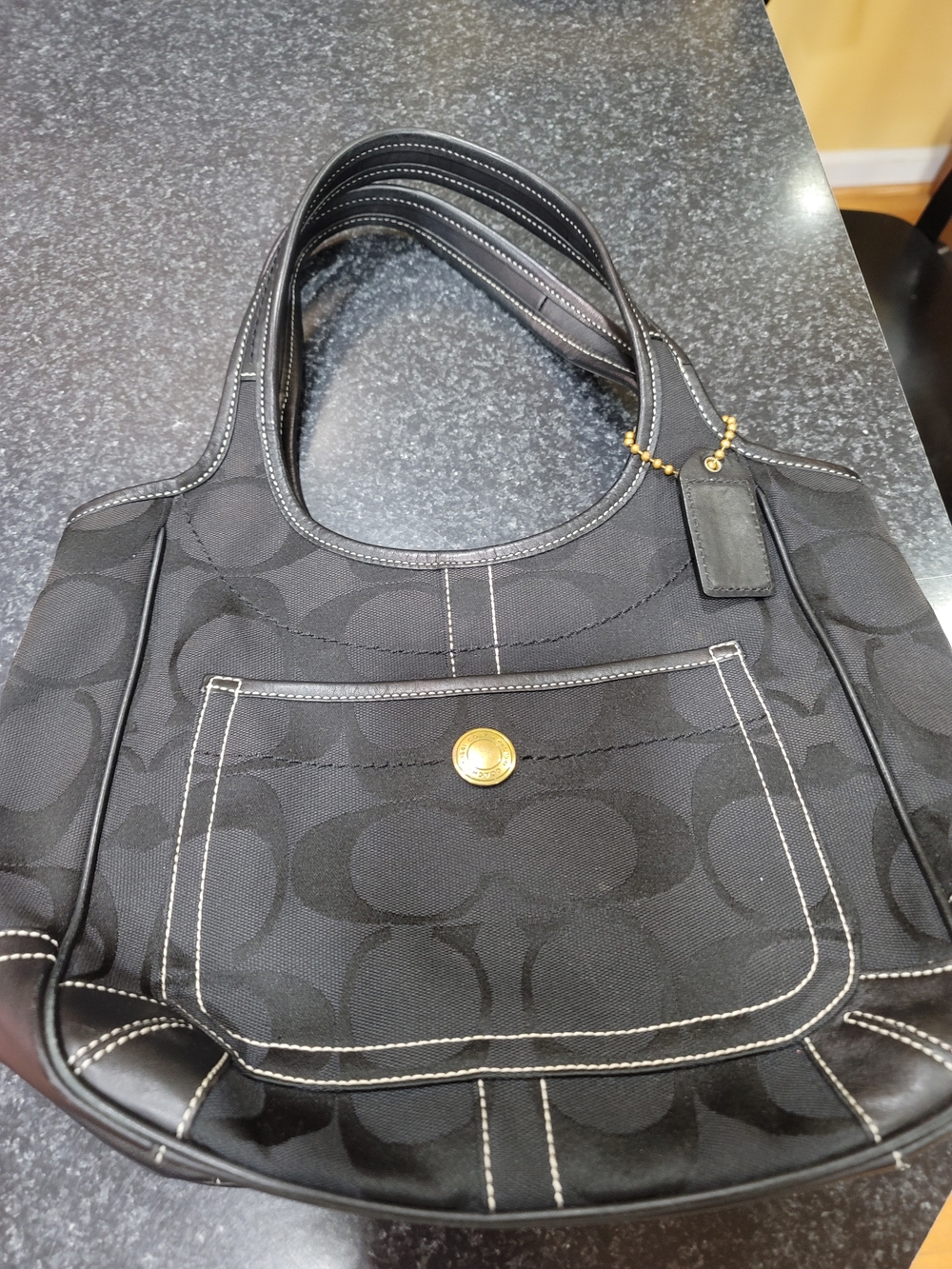 Coach Black Signature Canvas Shoulder Bag with Gold-Tone Accent
